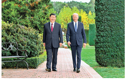 2023年，時任美國總統拜登（右）曾說，中國經濟陷困境不是好事，壞人遇到問題就會做壞事。圖/取自人民網