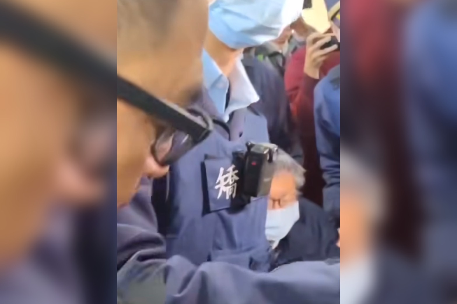 前台北市長柯文哲2日在戒護人員戒護下進入衛福部台北醫院，準備進行手術。圖/取自dearnana臉書