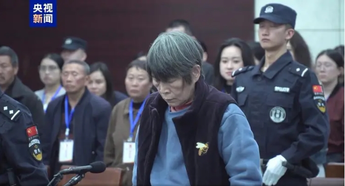 大陸人口販子余華英出庭的資料畫面。圖/取自央視新聞