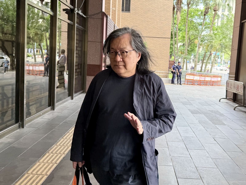 前北市都發局長林洲民於22日赴北院出庭作證。圖/中央社