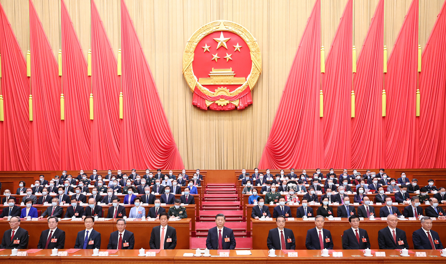 中共中央政治局近日召開會議，討論國務院擬提請第十四屆全國人民代表大會第二次會議審議的《政府工作報告》稿。圖為第十四屆國人大第一次會議。圖/取自中共台灣工作辦公室官方網站