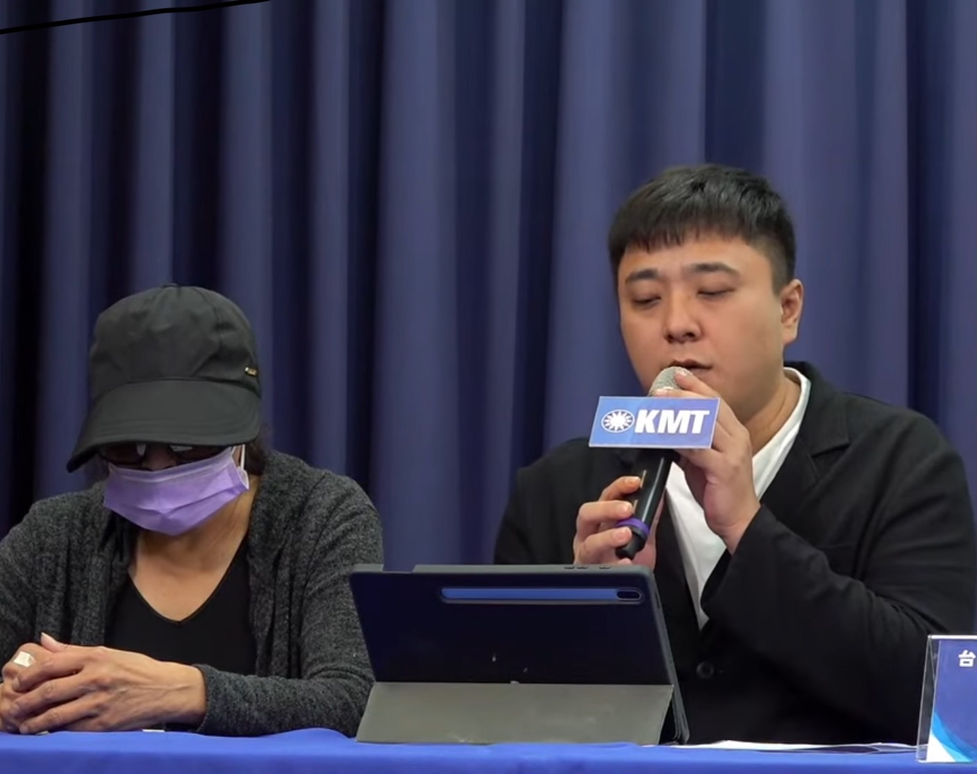 前基隆市議員候選人紀文荃於記者會中控綠營買通黑道「處理」他。圖／取自國民黨Youtube頻道