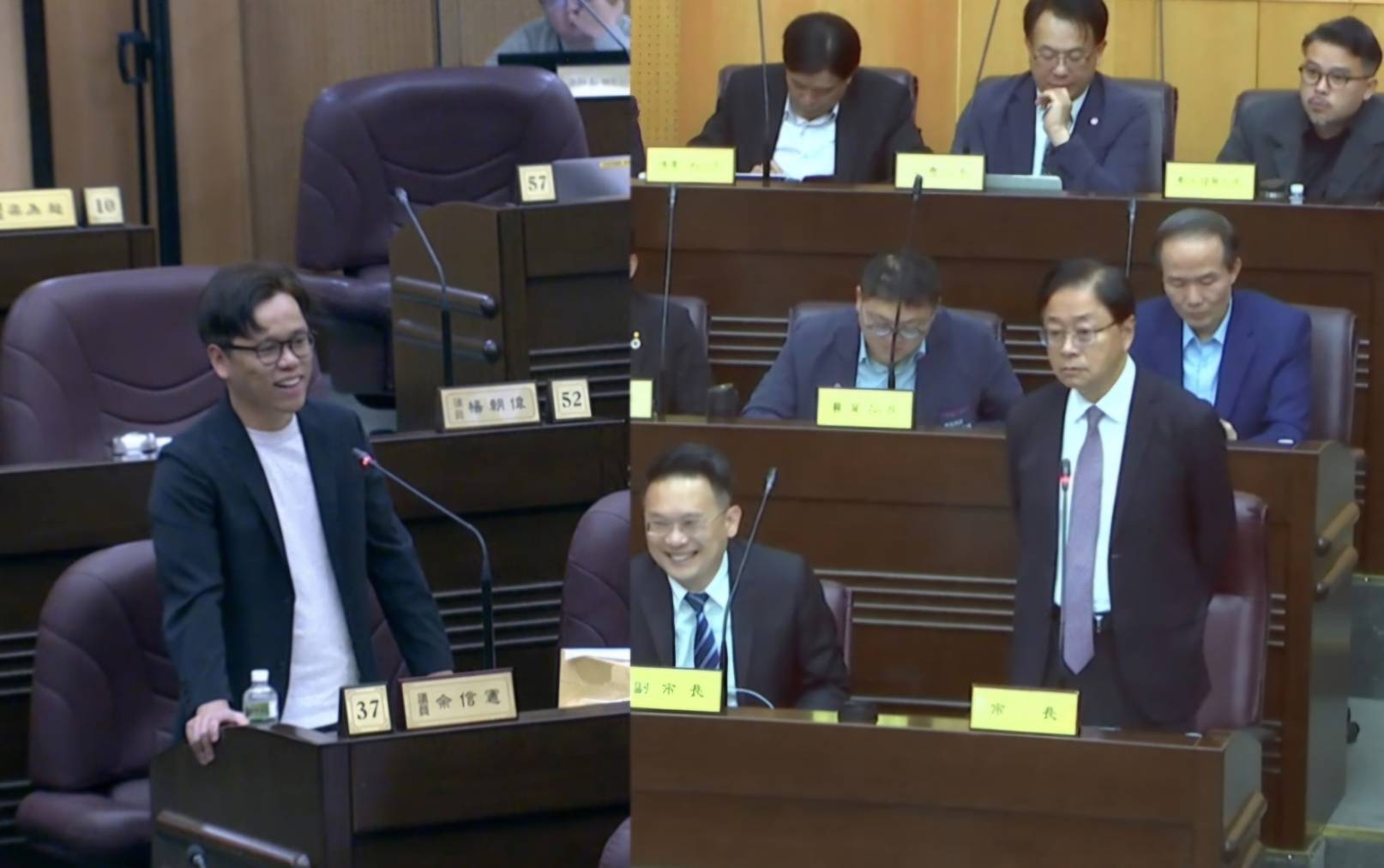 川普對台徵32%高關稅，讓地方政府緊張並緊急行動。在8日桃園市議會質詢中，民進黨議員余信憲（左）指張善政（前排右1）臉書寫的四大方向行動「產業界覺得不清楚」，張善政回「看不懂就不是產業界的人」，惹得副市長蘇俊斌（前排中）忍俊不住。圖／截取自桃園市議會議事直播